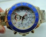 Rolex Yacht-Master II Watch Yellow Gold White Face Blue ceramic bezel 44mm